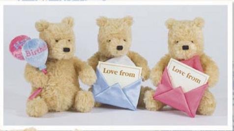 Childrens Toyshop  Toys : Mini Winnie the Pooh holding an envelope "Love From"