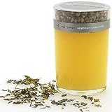 Red flower egyptian chamomile candle and scented petals