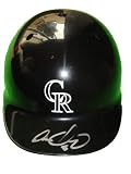 Carlos Gonzalez Autographed Colorado Rockies Full Size Batting Helmet, Proof Photo of Carlos Signing for Us.