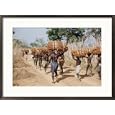 Tribal people near Shendam bring in harvested kaffir corn Subject Framed Art Poster Print by W. Robert Moore, 29x21