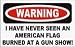 WARNING I HAVE NEVER SEEN AN AMERICAN FLAG BURNED AT A GUN SHOW! 11 oz. White Mug