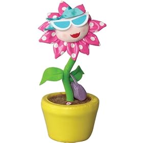 Click here to buy Movin and Groovin Blue Glasses Flower Speaker In Disp Box by Earthwood Toys.