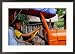 Boy Pretending to Drive Truck in Mrauk-U Village, Looking at Camera, Mrauk U, Myanmar (Burma) Framed Photographic Poster Print by Corey Wise, 29x21