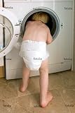 Wallmonkeys Peel and Stick Wall Graphic - Young Child Climbing inside a Washing Machine - 60