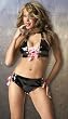 Patent Ribbon Lace Up 2 Piece Set Bra has Adjustable Snap Neck Closure and Elastic Back Panty has Full PVC Back Sizes Small/Medium or Large/X-Large