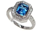 18K White Gold Emerald-Shape Blue-Topaz Color Stone Ring, Enhanced with Pave Set Diamonds.