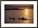 Boats silhouetted on the Mekong River at dusk, Phnom Penh, Cambodia Subject Framed Art Poster Print by Steve Raymer, 29x21