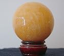 Orange Calcite Crystal Ball; 16cms Circumference - from Spiritual Gifts. Usually dispatched within 2 working days.