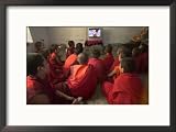 Young Monks Watch a Bollywood Movie at a Monastery Framed Photographic Poster Print, 21x17