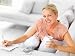 Woman Enjoying Coffee While Finding Jobs in the Newspaper Classi - 60"W x 45"H - Peel and Stick Wall Decal by Wallmonkeys