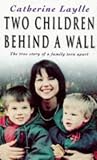 Two Children Behind a Wall