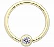 14 karat gold captive ring with clear CZ