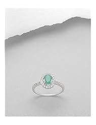 Rhodium plated ring set with oval emerald and surmounted with CZ In 92.5 Sterling Silver Ring