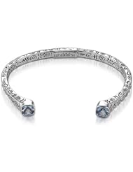Sterling Silver This sterling silver blue topaz Sara Blaine bangle bracelet is sure to add a touch of sophisticated style to any outfit.