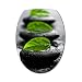 Stickersmania - Sticker abattant WC galets noirs et feuilles 26 x 34 cm.