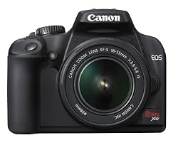 Canon Rebel XS 10.1MP Digital SLR Camera with EF-S 18-55mm f/3.5-5.6 IS Lens (Silver)
