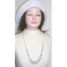 Click here to buy One Strand Graduated Ivory Pearl Separated By Silver Discs Medium Chain Necklace and Earrings for... by Gita.