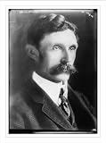 Newswire Photo (L): J.A. Holmes (Dr.)