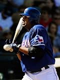 Surprise, AZ - March 11: Cleveland Indians v Texas Rangers - Mitch Morland, Carlos Santana Photographic Poster Print by Kevork Djansezian, 24x32