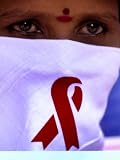 A Sex Worker Looks on During an Aids Awareness Rally on World Aids Day Associated Press Collection Photographic Poster Print, 18x24