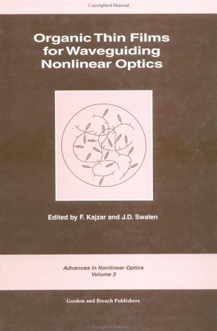 Organic Thin Films for Waveguiding Nonlinear Optics