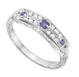 Sapphire (.38ct) and Bead Set Diamond (.46ct) Band