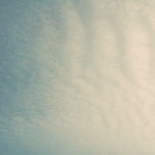 Ombre Clouds in a Teal Blue Sky