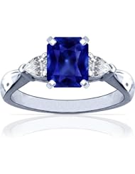 Platinum Emerald Cut Blue Sapphire Three Stone Ring
