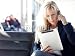 Wallmonkeys Peel and Stick Wall Decals - Business Women Calling and Working at the Airport with Touchpad - Removable Graphic