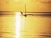 Outrigger Canoe and Fisherman in Silhouette at Sunrise off Jambiani, Zanzibar, Tanzania Photographic Poster Print by Lee Frost, 9x12