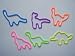 Dinosaur Assorted Rubber Band Bracelets 24 Pack. Contains, Stegosaurus, Brontosaurus, Tyrannosaurus Rex, and many others. Variety of colors, orange, blue, yellow, green, purple and pink