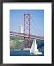 25th April Bridge Over the Tagus River and the Christ Statue in Background Framed Art...