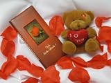 #8 - Geschenkset: Teddy mit Plüschherz I love you + Liebes-Schokolade 100 gr. + Rosenblätter