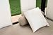 Beige Bolster and Cushion on a Canopy Bed outside - 18