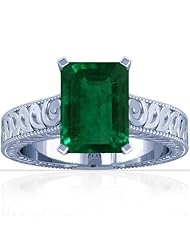 18K White Gold Emerald Cut Emerald Fana Designer Ring