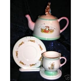 BEATRIX POTTER PETER RABBIT TEAPOT and COLLECTOR GIFT TEA SET, Features A Brand New Unused and in Mint Condition Colorful Peter Rabbit Beatrix Potter Character Art Tea Pot, Character Illustrated Cup and Saucer with a Clip-on Display Stand for the Cup & Saucer Service Set, A unique 4 pc. Collectable Set