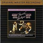 Click here to buy In Copenhagen by  John Darville, Harry Edison & Eddie Davis, and Kenny Drew .