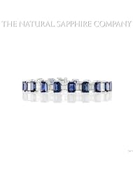 Total of 22.58ct. Blue Sapphire Bracelet with channel set baguette diamonds weighing 2.36ctw