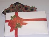 Scott's Cakes 1/2 lb. Milk Chocolate Covered Pretzel with Christmas Jimmies in a Ribbon n Holly Box