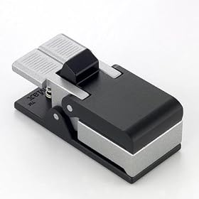 Book Biter -- a multi-function desktop tool, capable of serving as a book holder, memo... by Memo Books