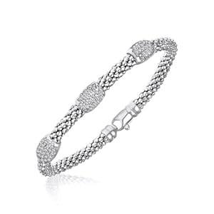 Sterling Silver Rhodium Popcorn Bangle with Diamond Barrel Stations (.18ct tw)