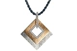 14K Yellow and White Gold Matte-Finish Diamond-Shaped Pendant, Enhanced with Pave Set Diamonds, Sliding on a 16 Black Silk Cord Necklace Set with an 18K Yellow Gold Clasp.