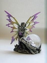 Garden Fairy - Fairy sitting by the clear ball