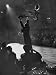 Can Can Dancer Held Up in the Air by a Performing Gentleman at the Paris Show Photographic Poster Print by Nat Farbman, 12x16
