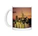 City skyline at sunset Photo Mugs
