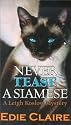 Never Tease a Siamese: A Leigh Koslow Mystery