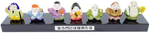 Japanese Handmade Seven Gods of Fortune Deities Shichifukujin Pottery Buddha Feng Shui Figurine Miniatures fixed on a Black Lacquer Wooden Base Japan Import Made in Japan