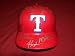 2010 Texas Rangers Team Autographed Red Full Size Batting Helmet with 27 Signatures Total, Proof Photos of the Rangers Signing for Us.