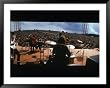 Huge Crowd Listening to a Band Onstage at the Woodstock Music and Art Festival Framed Art Poster Print by Bill Eppridge, 49x39