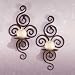 PAIR OF SWIRLING IRON HANGING WALL CANDLEHOLDERS SCONCE